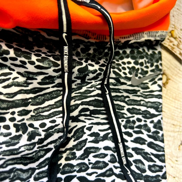 Nike Women’s XS leggings. Zebra print with neon orange accents.Brand new w/o tag - Picture 5 of 7